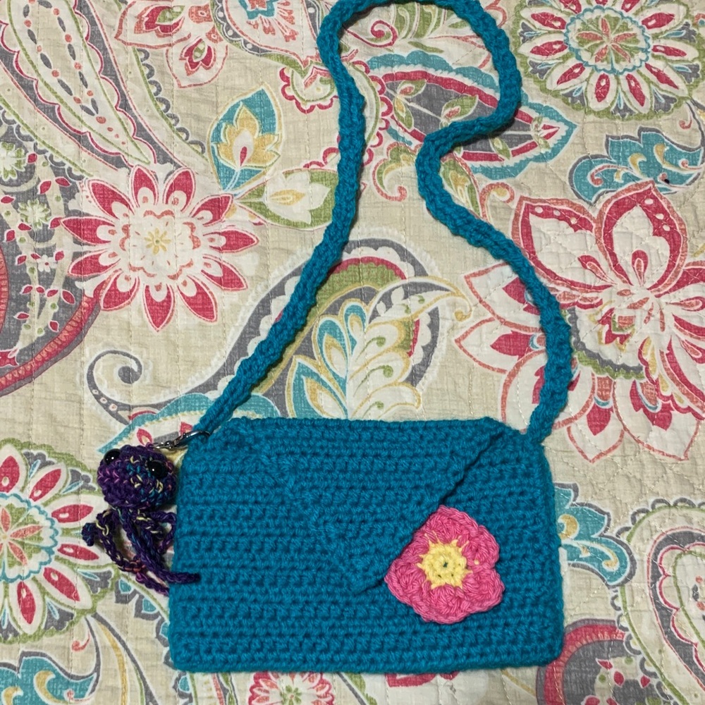 Children’s Teal Crochet Crossbody Bag with Pink Flower Accent